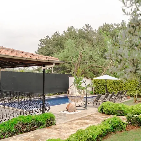 Дом отдыха Fethiye Oeluedeniz'De Dag Ve Doga Manzarali Lueks Villa A1 *